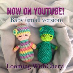 two small crocheted dolls sitting next to each other on a white blanket with text reading now on youtube baby small version