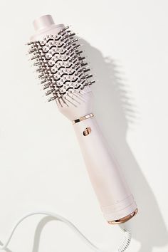 Highlights: Designed to dry and style in one go, the T3 AireBrush hair dryer brush delivers exceptional heat precision and even airflow to reduce styling time while protecting hair's natural moisture EvenStream vents equalize airflow across the brush surface for faster drying with less damage An oval brush design with perfect SmoothGrip bristle placement and a CeraGloss™ ceramic surface works to smooth strands, create bends, volumize, and boost shine Three heat and two speed settings deliver total styling personalization for healthy results on all hair types Dimensions: 18.3" L, 7.4" W, 3.9" D How To Use: Use a towel or allow hair to air-dry until hair is free of any excess moisture. Thoroughly detangle hair, then use clips to divide hair into 3-4" " sections before styling. Place brush at College Wishlist, Sleek Blowout, Detangle Hair, Dryer Brush, Brush Design, Oval Brush, Hair Dryer Brush, Hair Detangler, All Hair Types