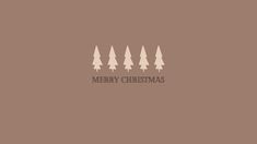 three trees with merry christmas written on the top and bottom, in front of a brown background