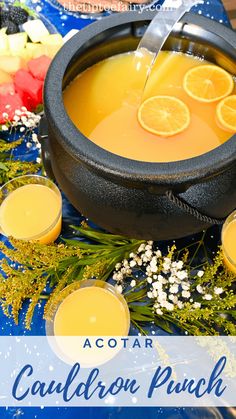 a bowl of soup with lemons and garnish on the side, surrounded by glasses