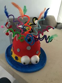 a birthday cake decorated with colorful decorations