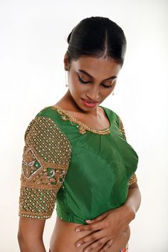 Elevate your style with this Forest Green Bridal Blouse crafted in Pure Silk featuring exquisite Zardozi Work. Perfect for pairing effortlessly with a saree or lehenga. Green Bridal Blouse, Aari Work Embroidery, Baluchari Saree, Golden Blouse, Saree Blouse Styles, Silver Blouse, Zardozi Work, Orange Saree, Net Blouses