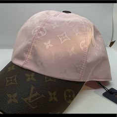 Brand New Pink And Brown Baseball Hat. Perfect For Those Not So Great Hair Days.Big Price Drop. So Sorry I Have Been In A Family Crisis And Not Following Up On Comments Or Posts. Designer Visor Hats For Spring, Luxury Summer Cap, Brown Baseball Hat, Pink And Brown, Louis Vuitton Accessories, Streetwear Fashion Women, So Sorry, Great Hair, Baseball Hat