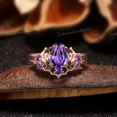 Witchy Coffin Amethyst Engagement Ring Set Spider Web Bat Ring Solid Gold Black Onyx Wedding Ring Set Purple Gemstone Ring Halloween Jewelry Black Onyx Ring Set: https://www.etsy.com/listing/1778384140 Garnet Ring Set: https://www.etsy.com/listing/1782283492 Alexandrite Ring Set: https://www.etsy.com/listing/1792981172 Peridot Ring Set: https://www.etsy.com/listing/1807186505 RING DESCRIPTION ✦Engagement Ring ✴Center Stone - Amethyst Shape - Coffin Cut Size - 6×8mm ✴Side Stones - Black Onyx & Am Onyx Wedding Ring, Bat Ring, Amethyst Engagement Ring, Amethyst Ring Engagement, Purple Rings, Alexandrite Ring, Jewelry Black, Black Onyx Ring, Garnet Ring