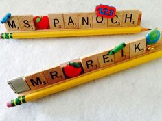 two wooden scrabbles with letters spelling the word mr and mrs