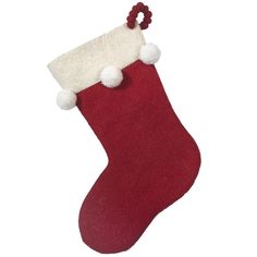 a red christmas stocking with white pom - poms hanging from the side