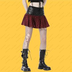 Women Gothic Short Red Plaid & Black Split Buckle Skirt Plus Tween Costume Women Gothic Short Red tartan and black leather-effect fabric. The skirt is detailed with buckle straps and has a zip fastening at the centre back. Comfort and fit are of utmost importance, and this skirt doesn't disappoint. With its adjustable buckles and elasticized waistband, it ensures a customized fit that flatters your figure and provides maximum comfort throughout the day or night. Pair this Women's Gothic Short Red Plaid & Black Split Buckle Skirt with a sleek black top or a lace-up corset, along with your favorite boots or stilettos, to complete a stunning and powerful ensemble. Whether you're attending a gothic club night, a music festival, or simply expressing your unique style on a casual outing, this sk Red Rock Style Mini Skirt, Rock Style Red Mini Skirt, Red Rock Mini Skirt, Red Punk Skirt For Parties, Red Punk Style Skirt For Party, Red Mini Skirt For Alternative Fashion, Fitted Punk Mini Skirt With Belt, Punk Style Fitted Mini Skirt With Belt, Red Fitted Alternative Style Skirt