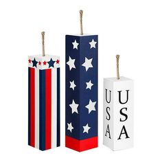 two wooden blocks with the word usa on them and an american flag design in red, white, and blue