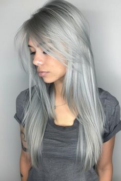 Woman with long, straight silver hair Silver And Blue Highlights On Dark Hair, Hairstyles For Silver Hair, Straight Silver Hair, Straight Grey Hair, Silver Hairstyles, 40 Hairstyles, Long Silver Hair, Silver White Hair, Long Layered Cuts