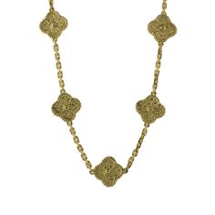 Add a touch of ornamental charm with our 'Alhambra' style quatrefoil necklace. Crafted in yellow gold, it features beautiful designs inspired by Van Cleef and Arpels' Alhambra line. Exquisite Gold Flower Shaped Necklace, Luxury Yellow Gold Necklaces With Intricate Design, Luxury Gold Filigree Necklace, Elegant Engraved Flower Necklaces, Elegant Engraved Flower Shape Necklaces, Van Cleef Alhambra, Van Cleef And Arpels, Van Cleef, Long Necklace