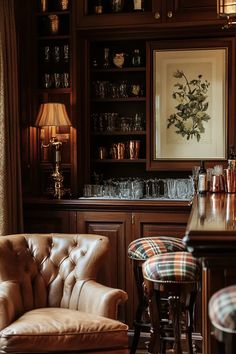 Cozy English country home bar with wooden cabinet, vintage glassware, leather armchair, and warm lighting Old English Pub Aesthetic, English Bar Design, English Pub Aesthetic, Country Pub Interior, Home Bar Corner, English Country Home Exterior, Fairytale Interior, English Hunting Lodge