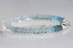 Handmade Aquamarine Bracelet, Blue Topaz Briolette Jewelry Gift, Blue Topaz Briolette Jewelry For Gifts, Briolette Blue Topaz For Jewelry Making, Aquamarine Bracelet Jewelry Gift, Aquamarine Bracelet Jewelry As A Gift, Stackable Rondelle Jewelry For Gift, Aquamarine Rondelle Jewelry Gift, Silver Apatite Jewelry For Anniversary