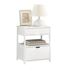 a white night stand with two drawers and a lamp on the end table next to it