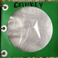 a green and white binder with the word geniusly on it's side