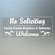 no soliciting family friends neighbors and deliverers welcome sticker on glass door