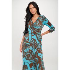 The Grace Wrap Dress is another West K's signature Maxi you will love! It has a fitted 3/4 sleeve and a faux wrap tie-waist detail in a full maxi length with wide bottom opening. This easy fit silhouette and comfort stretch will make this dress a favorite piece you'll want in every print. Made in USA. Machine washable. Fitted Wrap Dress With 3/4 Sleeves For Spring, Fitted Wrap Dress With 3/4 Sleeves For Summer, Fitted Summer Wrap Dress With 3/4 Sleeves, Fitted Brown V-neck Wrap Dress, Short Sleeve Maxi Dresses, Midi Short Sleeve Dress, Dress With Tie, Ruffle Shorts, The Grace