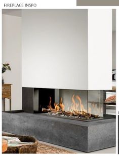 a modern fireplace with flames burning in it