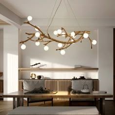 a chandelier hanging from the ceiling in a living room with furniture and lighting