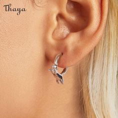 Design concept     The cute and lively form of the kitten brings us healing and companionship.    Detail    Brand：Thaya  Material：925 Silver+ oxidation+ platinum plated  Shape: Animal/Zodiac  Process：Electroplating  Gender：Female  Material Purity: 925 Silver  Inlay Material：Unmounted  Size：Height and width 15*4mm，Inner diameter of ear ring: 10mm  Weight about 3.4g Animal Zodiac, Ear Ring, Cat Earrings, Design Concept, Sterling Silver Earrings, Gender Female, Cute Cat, Concept Design, Silver Earrings