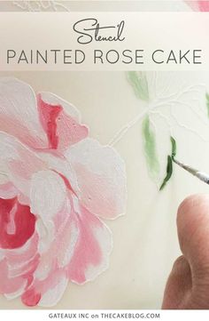 someone is painting a flower with acrylic paint on the paper and it looks like they have painted roses