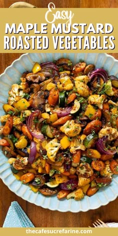 a plate full of roasted vegetables with text overlay that reads easy maple mustard roasted vegetables