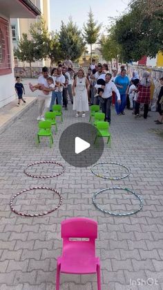 a group of children playing with toys in the street