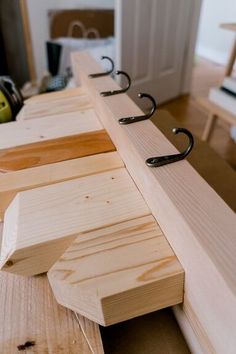 several pieces of wood sitting on top of a table