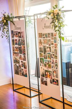 a display case with pictures and flowers on the wall next to a window in a room