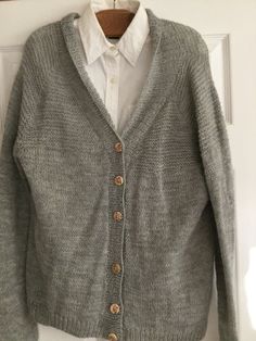 Gray women's cardigan with fun-flowery buttons , perfect for the office over a white blouse or a T-shirt sitting at home reading,  Amazingly soft and lightweight perfect addition to your wardrobe for any occasion, it's a timeless design in a neutral gray color sure to become a staple in your closet for years to come. It's recommended to hand wash this item and lay it flat to dry This cardigan was made by hand in a pet-free and smoke-free environment and ships free priority mail the very next business day Fall Sweater With Buttons And Relaxed Fit, Fall Sweater With Buttons In Relaxed Fit, Fall Relaxed Fit Sweater With Buttons, Fall Cotton Sweater With Buttons, Relaxed Fit Knit Button-up Sweater, Cotton Button-up Sweater With Buttons, Knit Cardigan With Buttons In Relaxed Fit, Knit Sweater With Buttons In Relaxed Fit, Relaxed Fit Knit Cardigan With Buttons