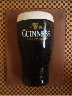 a guinness glass sitting on top of a table