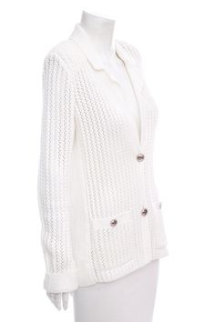 Chanel White Knit Cardigan Sweater with "La Pausa" Buttons. This item is in very good condition.Size: 36Bust: 38"Waist: 34"Hip: 36"Length: 26.5"*Please note that measurements have been taken on a flat surface and are an approximation. Brand = Chanel Color = White Size = 36 Condition = Very Good Item Number: 11107-91 Item ID: 172158 Category: Sweater Chanel Cardigan, Chanel Sweater, White Knit Cardigan, Chanel White, Ysl Shoes, Jimmy Choo Sunglasses, Burberry Sunglasses, Hermes Shoes, Dior Sunglasses