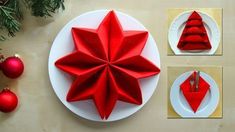 a red origami star on a white plate next to christmas ornaments and decorations