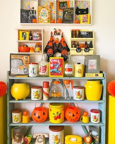 a shelf filled with lots of halloween decorations