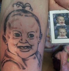 a person with a tattoo on their arm holding up a small photo and an infant's face