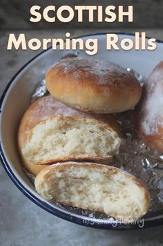 a bowl filled with donuts covered in frosting