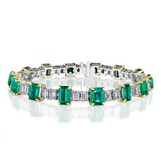 Timeless luxury bracelet with 14 natural deep green emeralds. These emeralds shine and are accentuated by 28 white diamonds, all GIA certified. The 18-carat yellow gold prongs secure the green emeralds. A masterpiece weighing 24.15 carats. Formal Emerald Cut Diamond Bracelet, Green Diamond Bracelet With Brilliant Cut, Green Diamond Bracelets With Brilliant Cut, Fine Jewelry Emerald Bracelet With Brilliant Cut, Luxury Green Brilliant Cut Diamond Bracelet, Luxury Yellow Gold Emerald Cut Bracelet, Luxury Green Tennis Bracelet For Formal Events, Green Brilliant Cut Diamond Bracelet, Green Brilliant Cut Diamond Bracelet Fine Jewelry