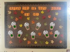 a bulletin board with cupcakes and leaves on it