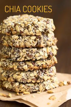 three cookies stacked on top of each other with chocolate chips and nuts in the middle