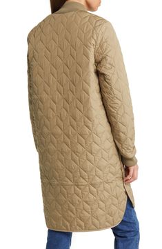 This longline jacket broadcasts a beautiful quilted pattern and knit ribbed trims for cozy detail. 37" front length; 38 1/2" back length (size 36FR) Lined 100% polyester Machine wash, dry flat Imported Quilted Long Coat For Fall, Quilted Long Sleeve Outerwear For Layering, Long Sleeve Quilted Outerwear For Layering, Long Quilted Jacket, Longline Jacket, Ilse Jacobsen, Quilted Pattern, Quilted Jacket, Long A Line