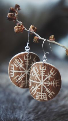 "Vegvísir"  Big handmade earrings decorated with the Scandinavian The Pointer of the Way -symbol. It guides you through life even when you are unsure of the path. Size of the antler part ø: Approx. 3cm Materials used: Reindeer antler & sterling silver Note: Please take the jewelry off when showering, swimming etc. to maintain the best possible condition.  ⌘ When buying this unique item you support young artist from the North, Finland. The main material used is naturally shed reindeer antler from Finnish Jewelry, Finnish Lapland, Symbole Viking, Antler Earrings, Nordic Vikings, Reindeer Antlers, Viking Symbols, Small Village, Nature Jewelry