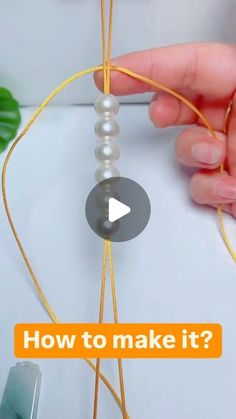 someone is making something out of string and beads with the words how to make it?