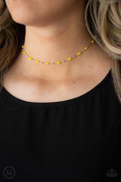 Dainty silver beads and cylindrical Illuminating beads delicately link around the neck, creating a minimalist inspired pop of color. Features an adjustable clasp closure.

Sold as one individual choker necklace. Includes one pair of matching earrings. Yellow Choker, Yellow Necklace, Yellow Jewelry, Bling Necklace, Chocker Necklace, Paparazzi Accessories, Beaded Choker Necklace, Paparazzi Jewelry, Beaded Choker