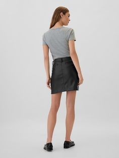 Smooth faux leather. Hook and bar closure, zip fly. Front slant pockets, welt pockets at back. #516923 Leather Mini Skirts, Leather Mini, Welt Pockets, Welt Pocket, Vegan Leather, Mini Skirt, Gap, Mini Skirts, Faux Leather