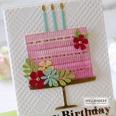 a birthday card with a pink cake on it