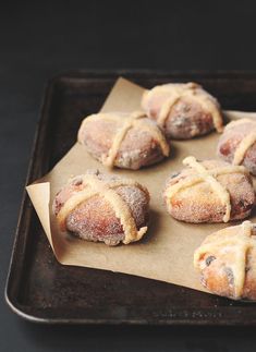 several pastries on a baking tray ready to be eaten