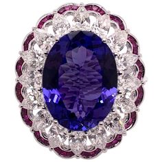 Luxury Amethyst Tanzanite Ring In Fine Jewelry Style, Luxury Tanzanite Wedding And Engagement Rings, Luxury Tanzanite Ring Jewelry, Luxury Tanzanite Diamond Wedding Ring, Luxury Tanzanite Exquisite Jewelry, Luxury Tanzanite Jewelry With Diamond Accents, Rubies And Diamonds, Dinner Ring, Cocktail Dinner