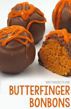 chocolate covered candies with orange drizzles on white table top, ready to be eaten