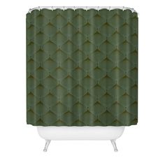 a green shower curtain with an abstract pattern on the front and back of it,