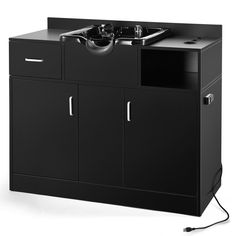 a black cabinet with a sink and power cord attached to the sideboard, on an isolated white background