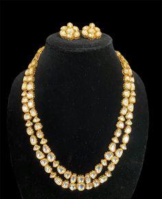 Premium quality kundan necklace set with stunning studs. The necklace is adjustable to your desired length. Perfect for both, everyday wear or special occasions. The set is beautifully designed to complement any outfit, adding a touch of elegance and sophistication to your look.  The necklace set makes for an ideal gift for yourself or a loved one. Gold Kundan Necklace With Dori Work, Kundan Necklace With Dori Work As A Gift, Kundan Necklace With Dori Work For Gift, Elegant Gold Kundan Necklace With Dori Work, Kundan Necklace With Dori Work For Diwali, Temple Jewelry Kundan With Dori Work, Elegant Kundan Necklace With Dori Work, Kundan Temple Jewelry With Dori Work, Elegant Kundan Necklace With Dori Work For Festive Occasions